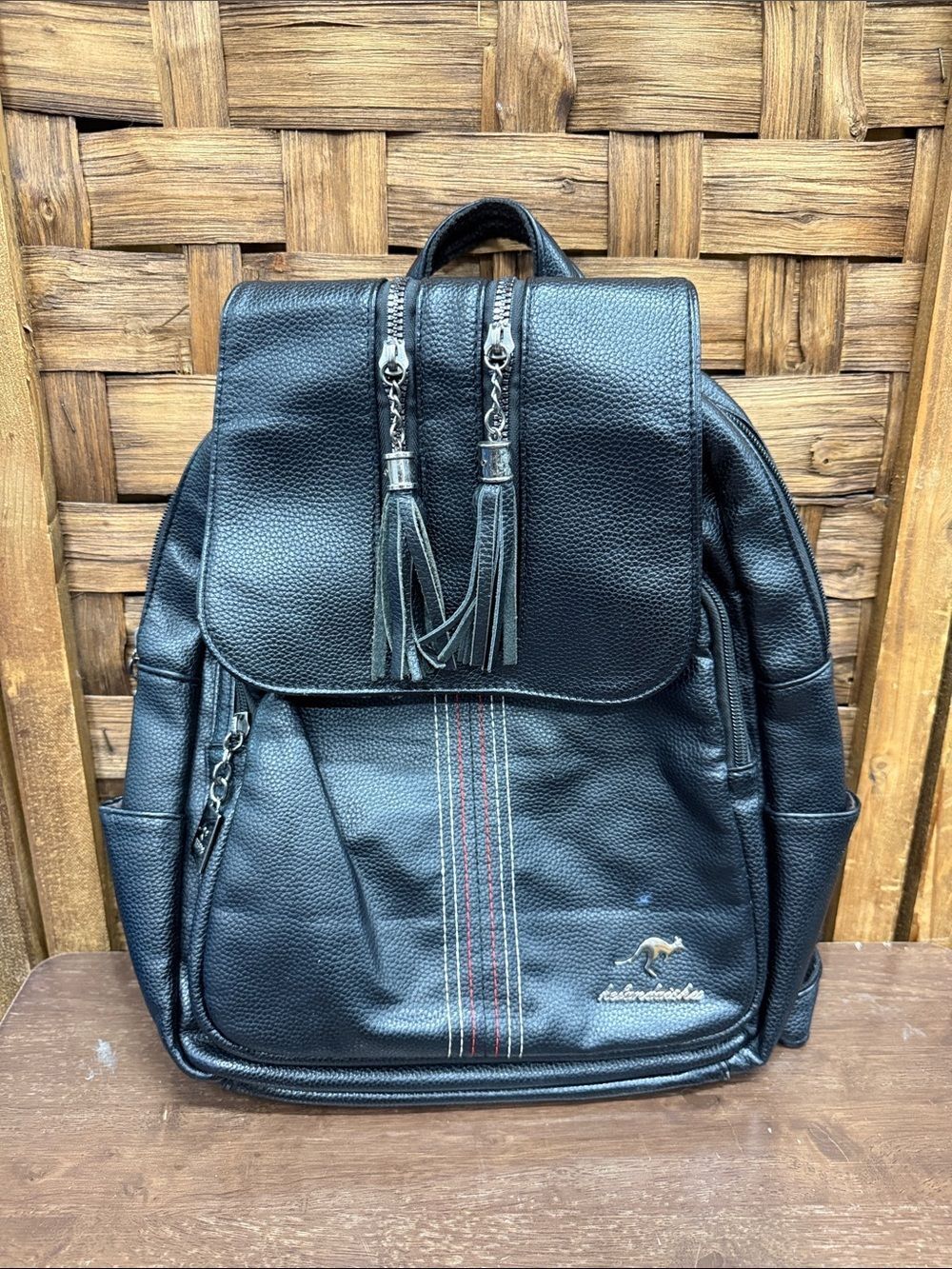 Hefan Daishu Black Faux-Leather Backpack with Tassel Zippers